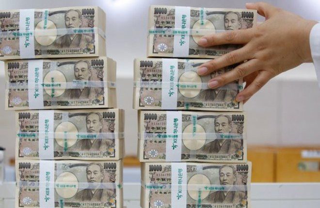 الين الياباني يهوى لأدنى مستوى في 24 عاما أمام الدولار